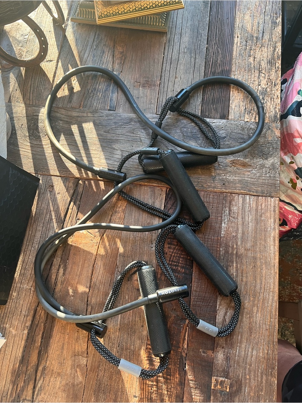 Peloton accessories: Resistance bands(3), yoga strap, wrenches in bag